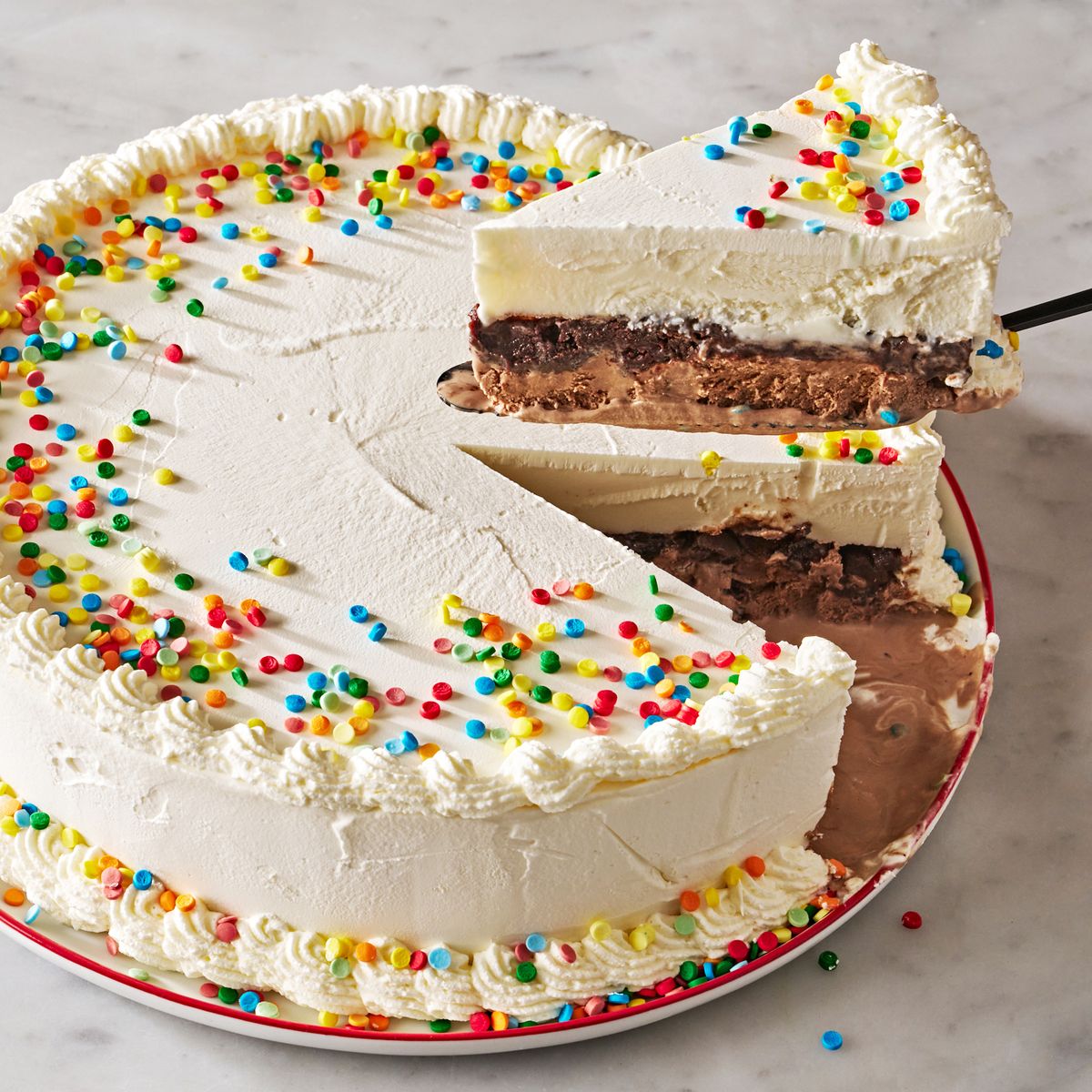 copycat dairy queen ice cream cake with slice lifting out