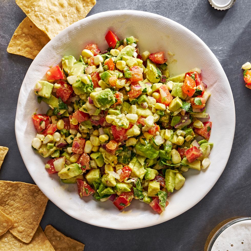 diced avocado tossed with tomato, fresh corn, red onion, jalapeno, cilantro, and lime juice, served with tortilla chips