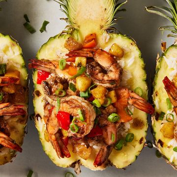 jerk marinated and grilled shrimp tossed with fresh pineapple and sweet bell pepper served over ice in a hollowed pineapple bowl