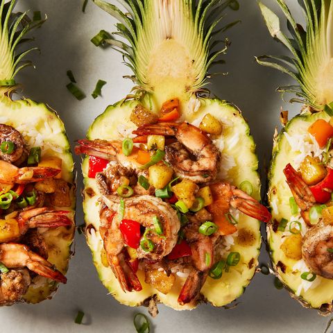 jerk marinated and grilled shrimp tossed with fresh pineapple and sweet bell pepper served over ice in a hollowed pineapple bowl