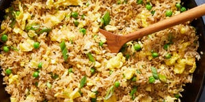 fried rice with eggs, scallions and peas