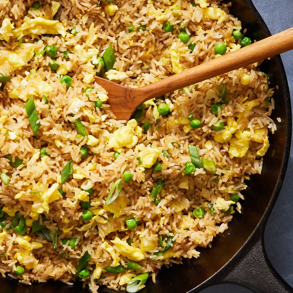 fried rice with eggs, scallions and peas