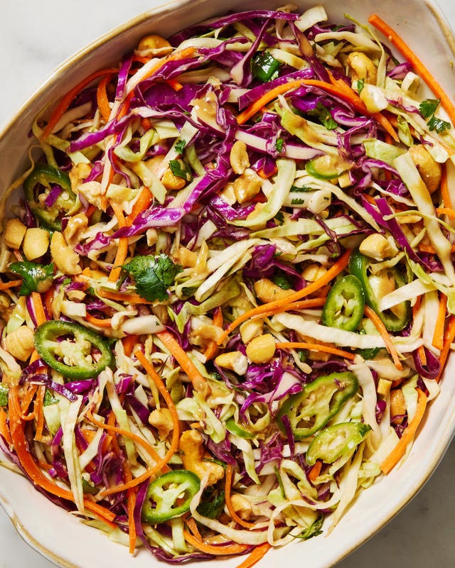 thai style slaw with green red cabbage carrot jalapeno cilantro basil peanut soy sesame dressing and peanuts