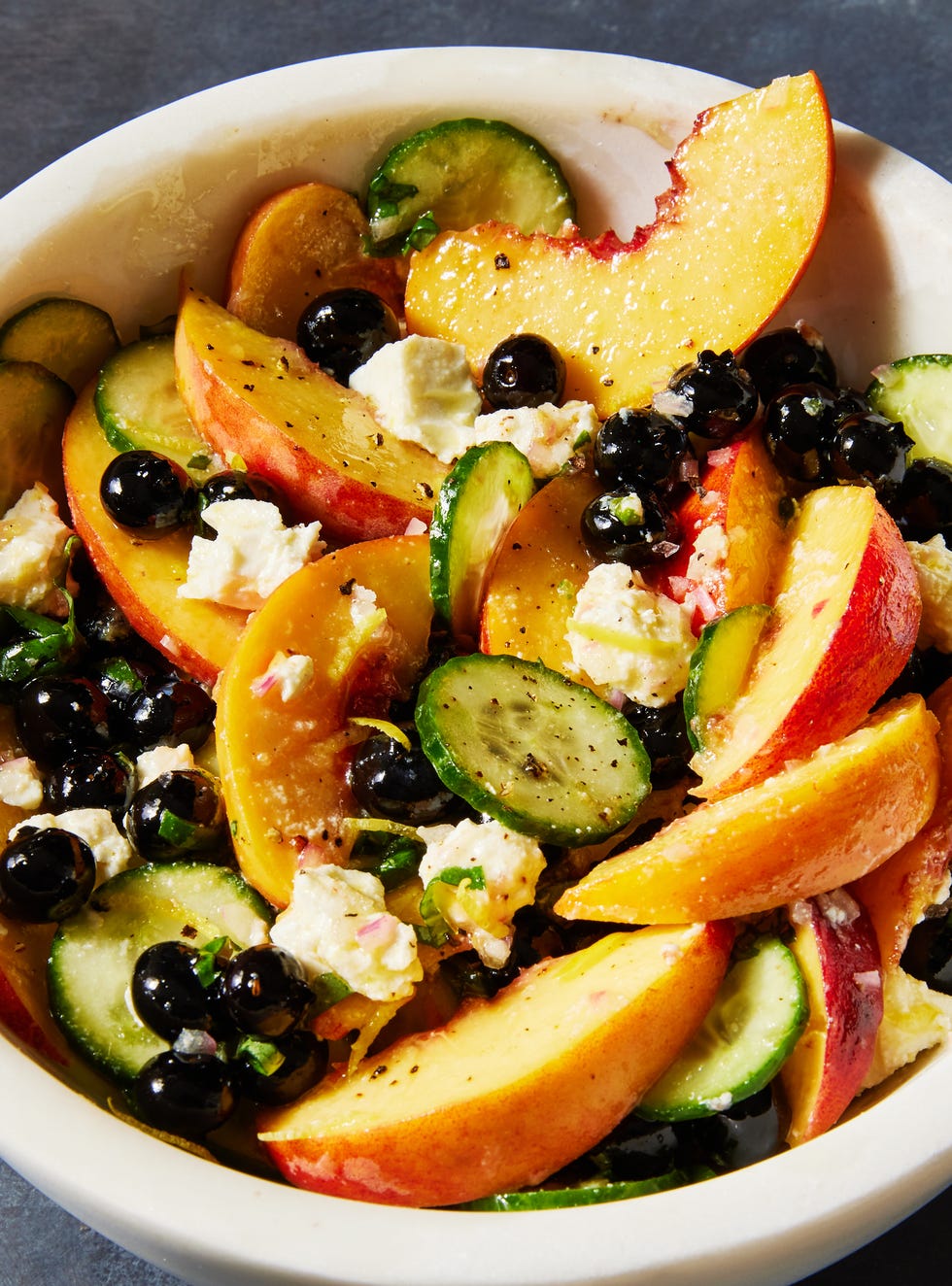 blueberry peach feta and cucumber salad with basil shallot white balsamic dressing