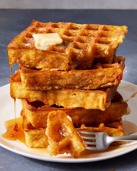 Classic Homemade Waffles square classic waffles topped with butter and drizzled with maple syrup