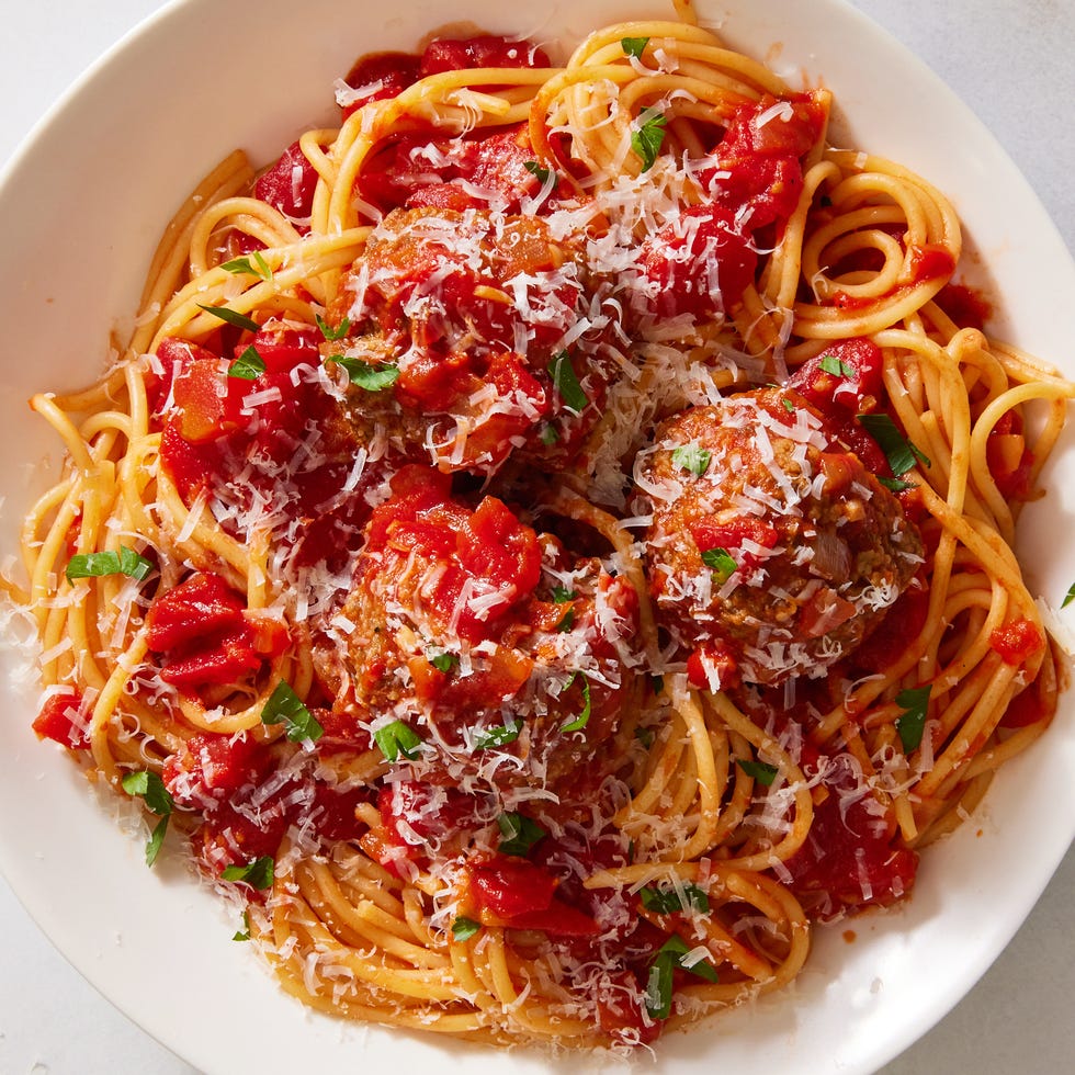 copycat olive garden meatballs with spaghetti in a bowl
