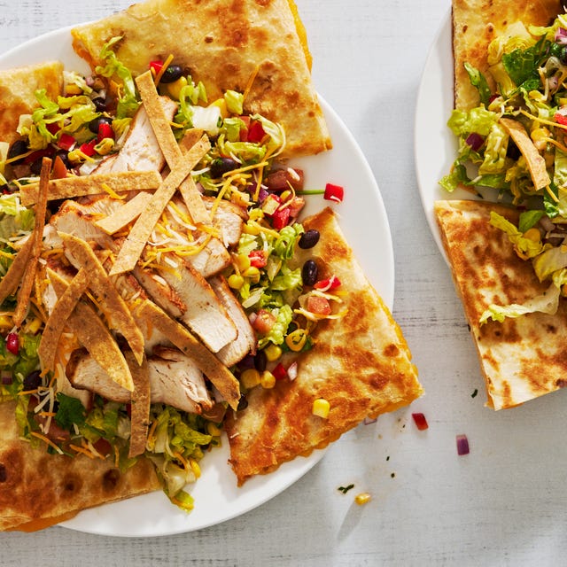 Chili's Quesadilla Explosion Salad two plates of copycat chili's quesadilla explosion salad on a white table