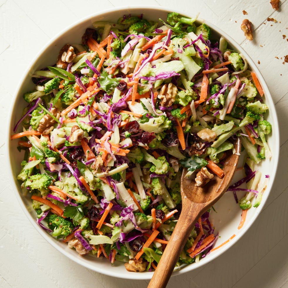 broccoli slaw with cabbage, carrots, scallions, toasted walnuts, dried cranberries, and maple dijon dressing