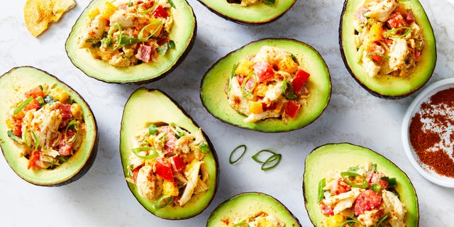 ripe avocado stuffed with chili and cumin spiced lump crab, tomato, mango, and scallion, served with plantain chips