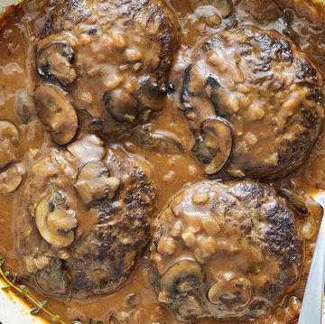 salisbury steak in a pan with mushroom gravy