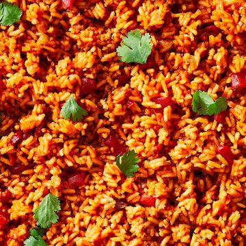 spanish rice garnished with cilantro leaves