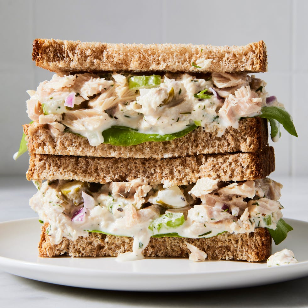 stack of tuna salad sandwiches on whole wheat bread