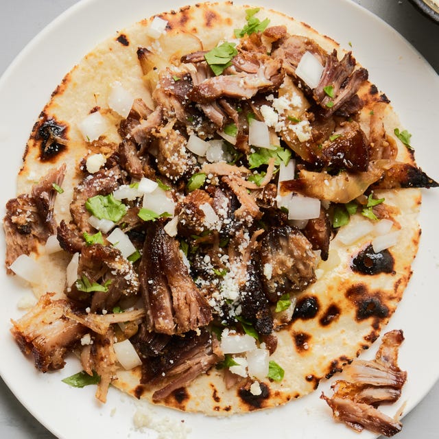 tender roast pork shoulder seasoned with cumin, garlic, onion, oregano, and orange