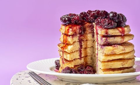 golden cornmeal pancakes with blueberry compote