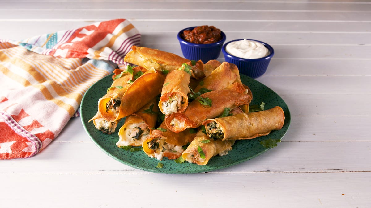 preview for The BEST Taquitos Are Filled With Cheesy Chicken Spinach & Artichoke Dip