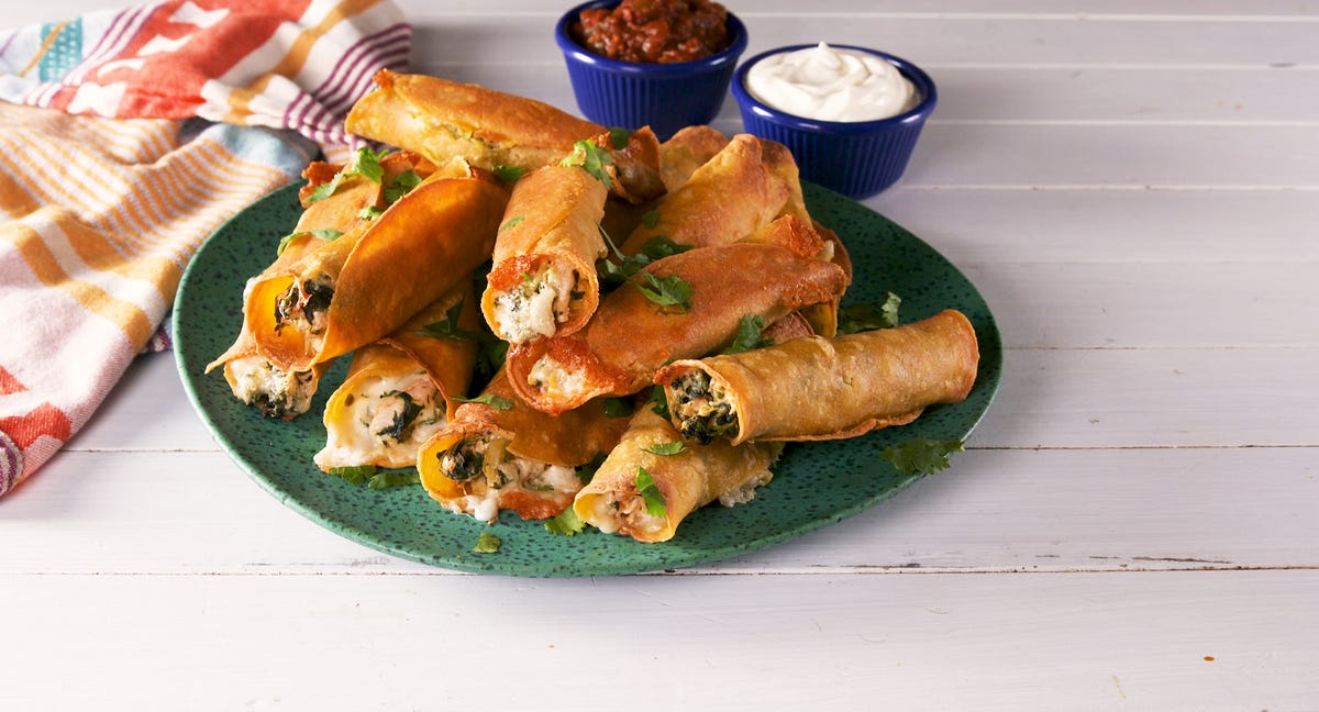 Video player poster image preview for The BEST Taquitos Are Filled With Cheesy Chicken Spinach & Artichoke Dip