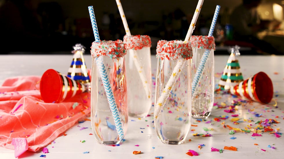 Food, Drinking straw, Sweetness, Dessert, Birthday candle, Confectionery, Cream, Sprinkles, Cuisine, Party supply, 