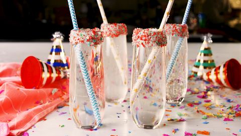 Food, Drinking straw, Sweetness, Dessert, Birthday candle, Confectionery, Cream, Sprinkles, Cuisine, Party supply, 