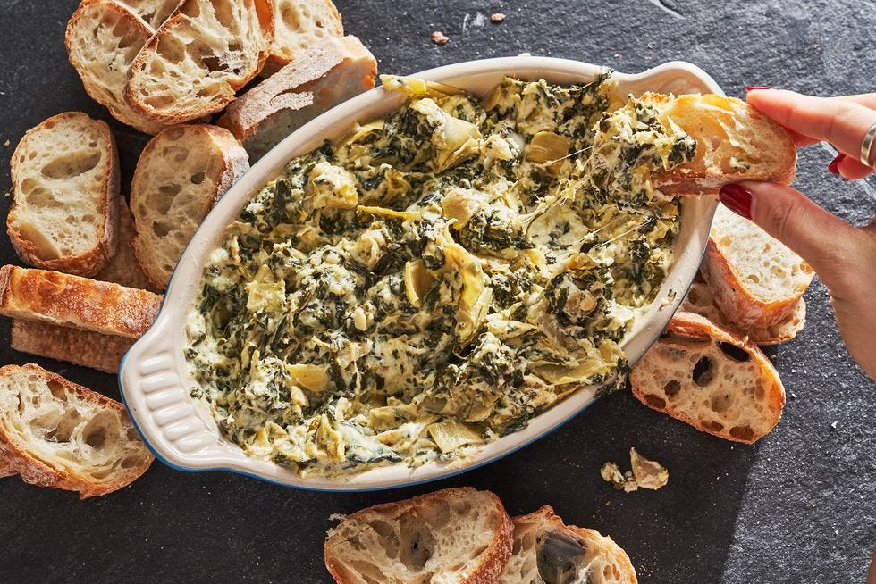 Making Spinach Artichoke Dip In The Slow Cooker Is Our New Favorite Party Trick