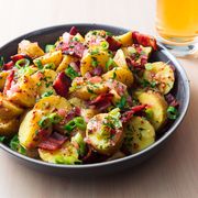 boiled potatoes in german potato salad with bacon and mustard