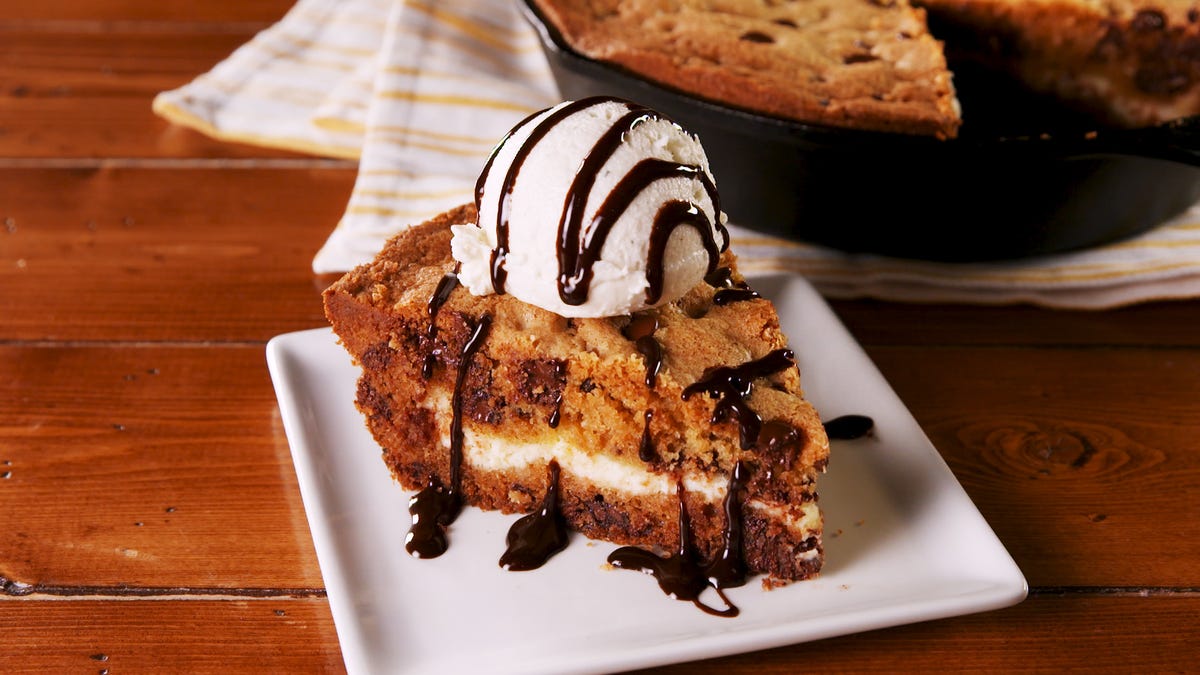 preview for This Giant Cheesecake Stuffed Cookie Is The Most Extra Dessert Of All Time