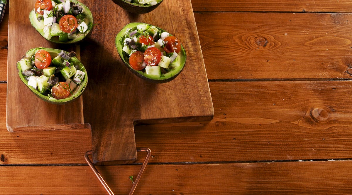 Video player poster image preview for Greek Stuffed Avocado Is Perfect For A Light Lunch