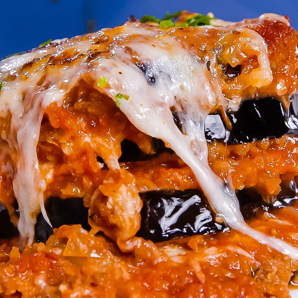 layered dish featuring eggplant and melted cheese