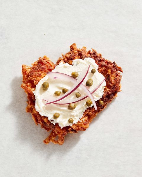 latkes with whipped cream cheese, red onion, and capers  delishcom