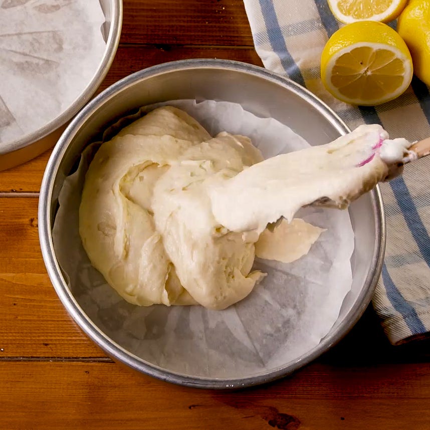 spreading batter in a round cake pan
