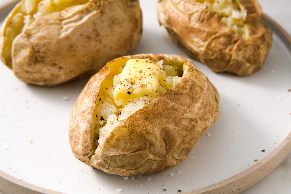 Indian-style baked potatoes recipe - BBC Food