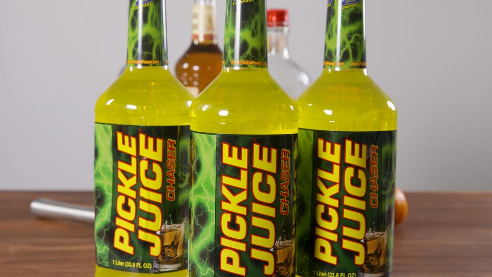 Bottle, Liqueur, Drink, Glass bottle, Alcoholic beverage, Beer bottle, Distilled beverage, Yellow, Wine bottle, Beer, 