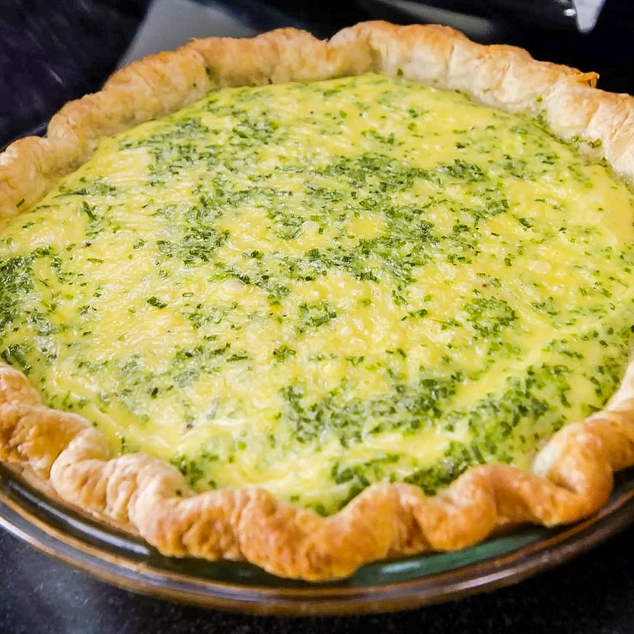 savory pie with a green topping