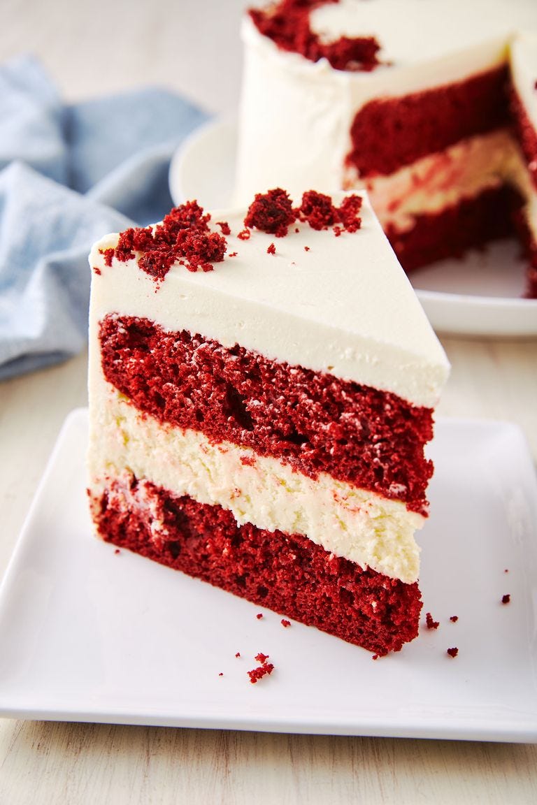 red velvet cheesecake slice on white plate