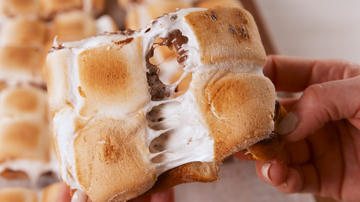 Video player poster image preview for Sheet-Pan S'mores = The Most GENIUS Way To Use Crescent Dough