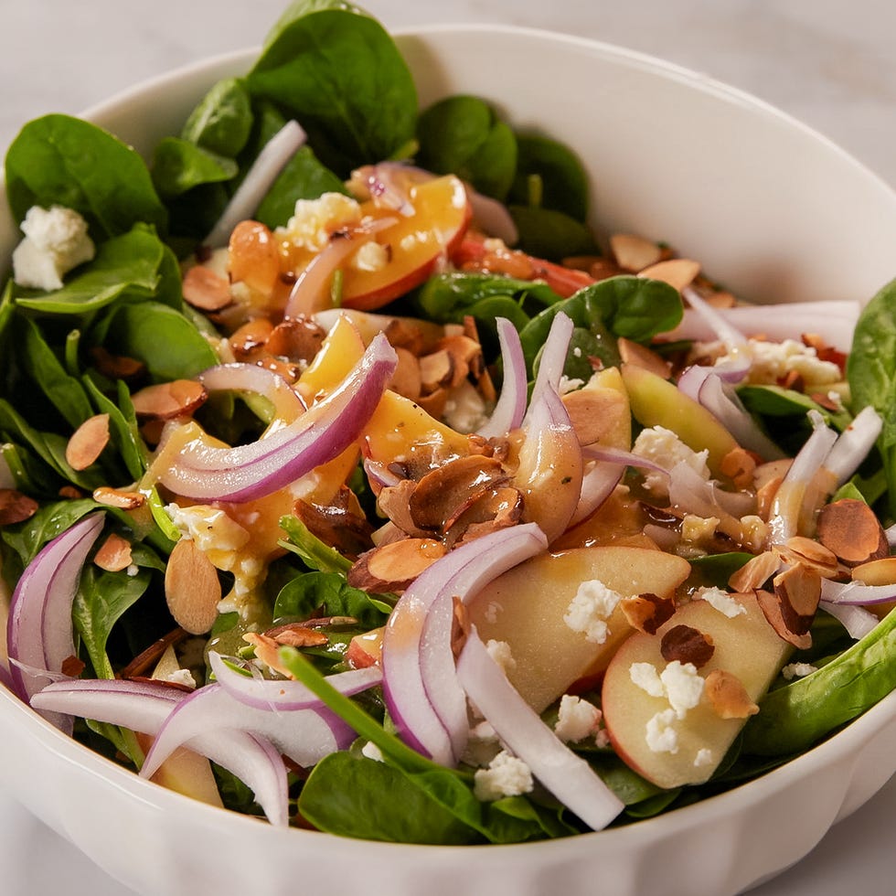 spinach, red onions, almonds, feta salad tossed in dressing