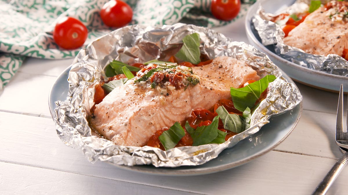 preview for We'll Be Making These Tuscan Butter Salmon Foil Packs All Year Long