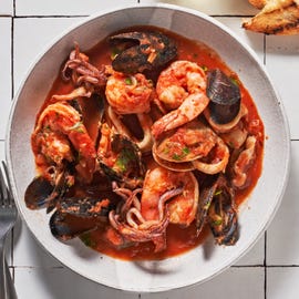 zuppa di pesce with mussels clams shrimp squid tomato white wine andgarlic