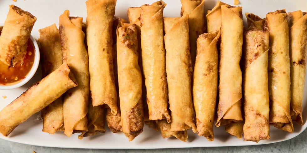 ground pork, shrimp, crunchy vegetables, and aromatics, wrapped in a paper thin shell, and deep fried until shatteringly crisp