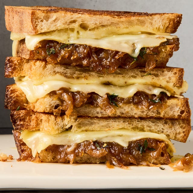 french onion grilled cheese sandwiches in a stack