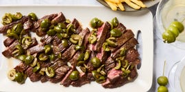 seared skirt steak topped with buttery green olive, gin, and vermouth sauce and served with crispy golden french fries