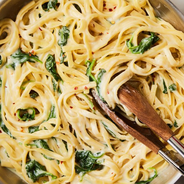 creamy high protein cottage cheese alfredo with spinach and fettuccine