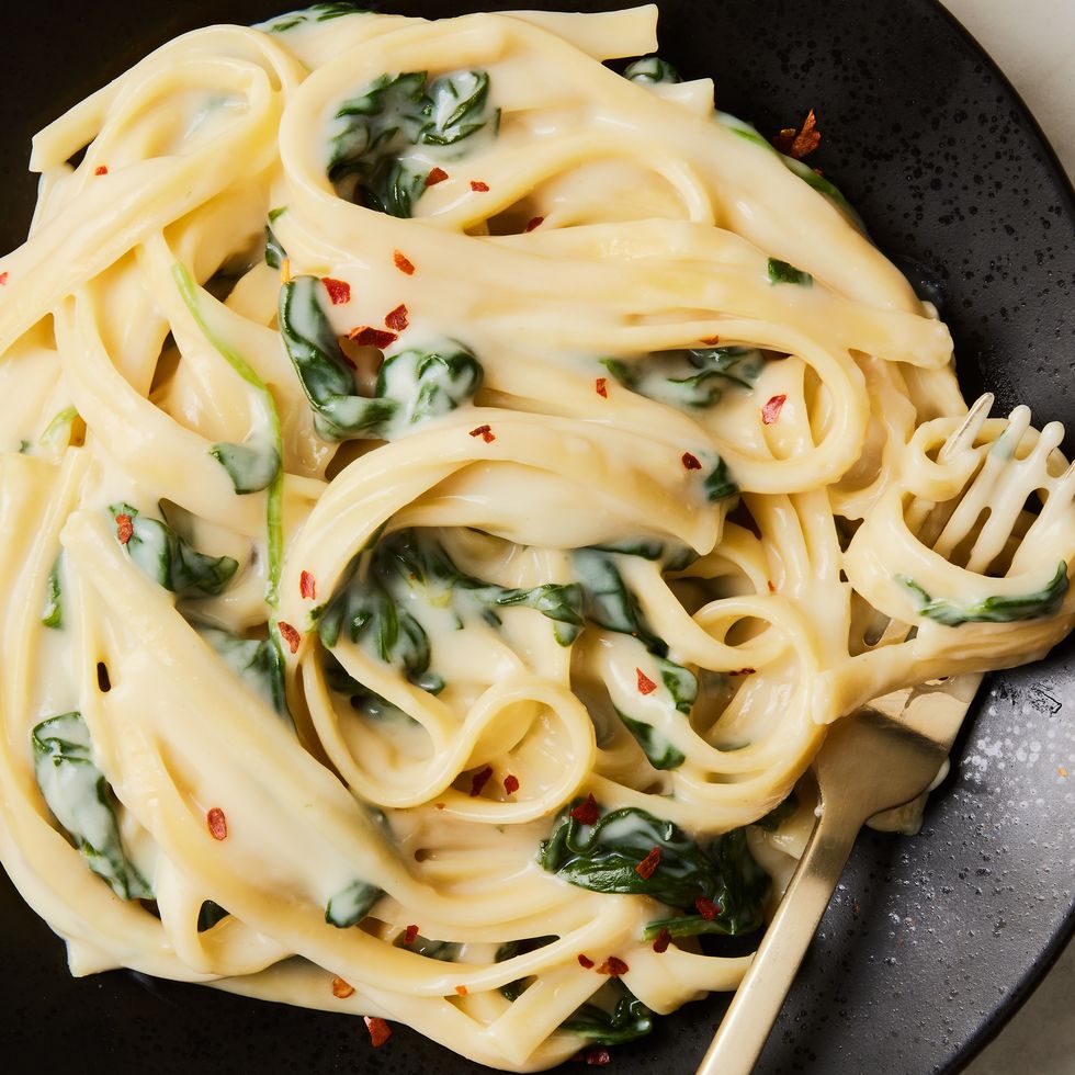 creamy high protein cottage cheese alfredo with spinach and fettuccine