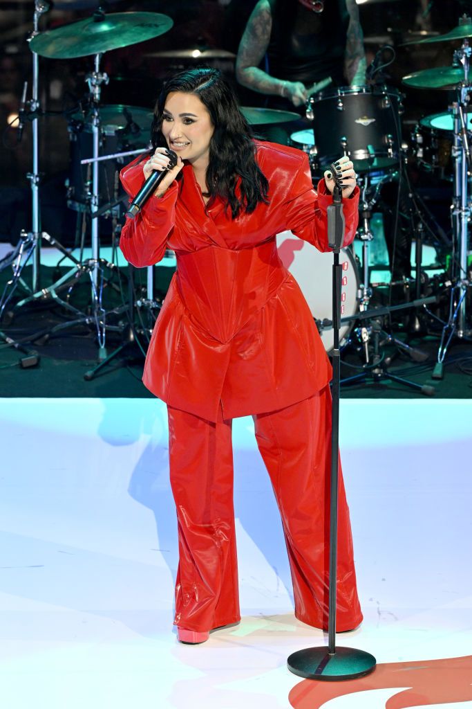 demi lovato performing at the american heart association's red dress collection concert 2024