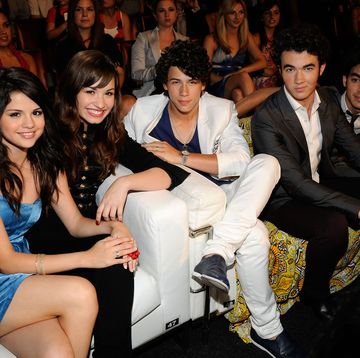 exclusive, premium rates apply los angeles, ca   august 03  exclusive actress selena gomez, singer demi lovato and recording artists the jonas brothers during the 2008 teen choice awards at gibson amphitheater on august 3, 2008 in los angeles, california  photo by k mazurtca 2008wireimage
