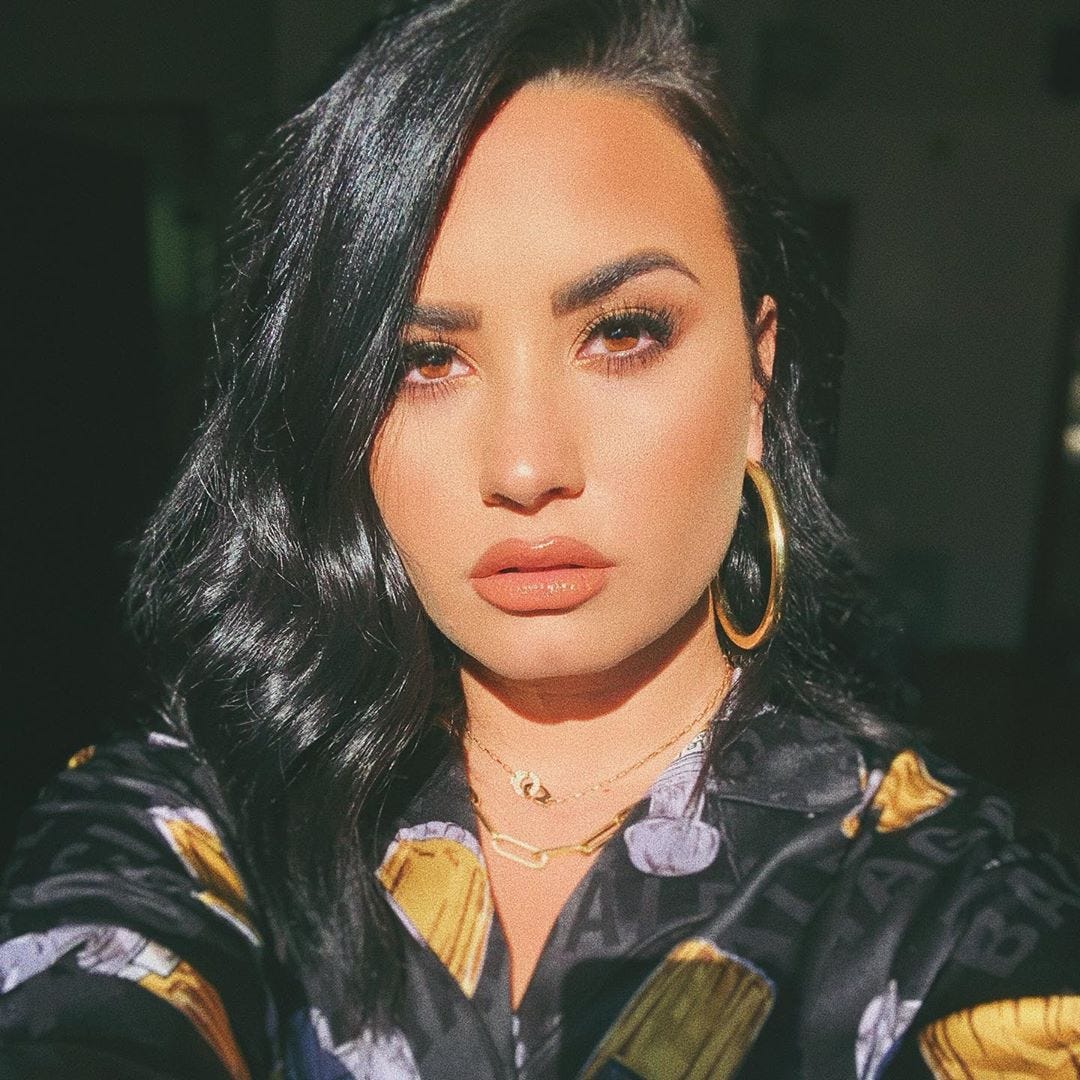 Demi Lovato Wears Tie-Dye Sweatsuit On Vacation With Boyfriend Max Ehrich