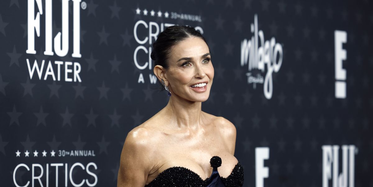 Demi Moore Wears a Strapless Navy Dress at the 2025 Critics Choice Awards