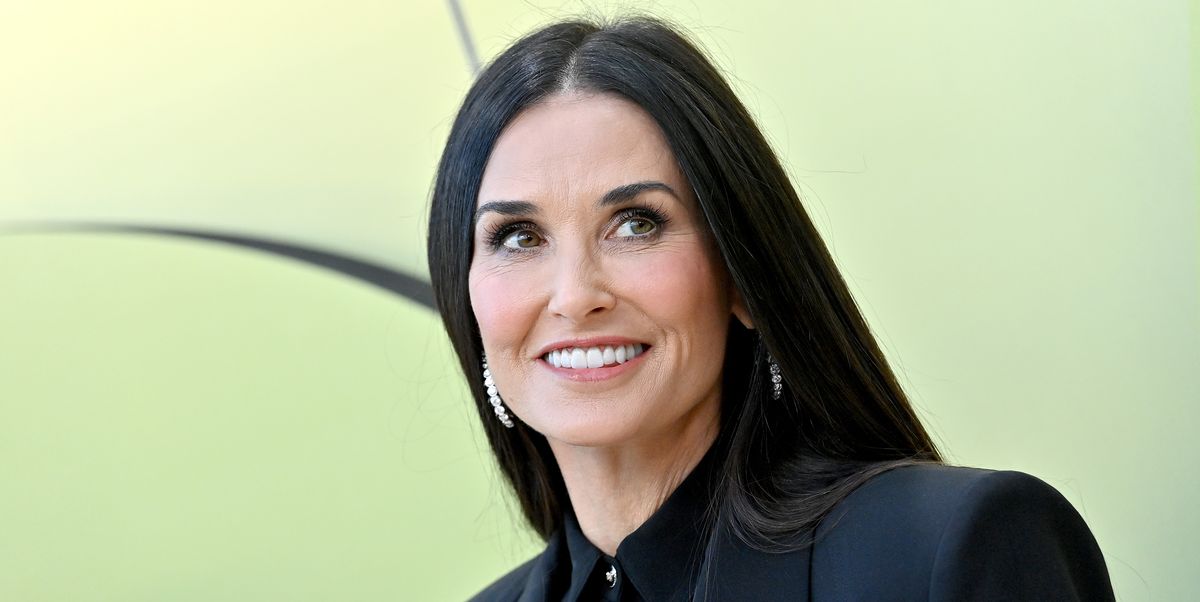Demi Moore, 60, Poses Under Waterfall, Shows Off Toned Abs in Black String Bikini