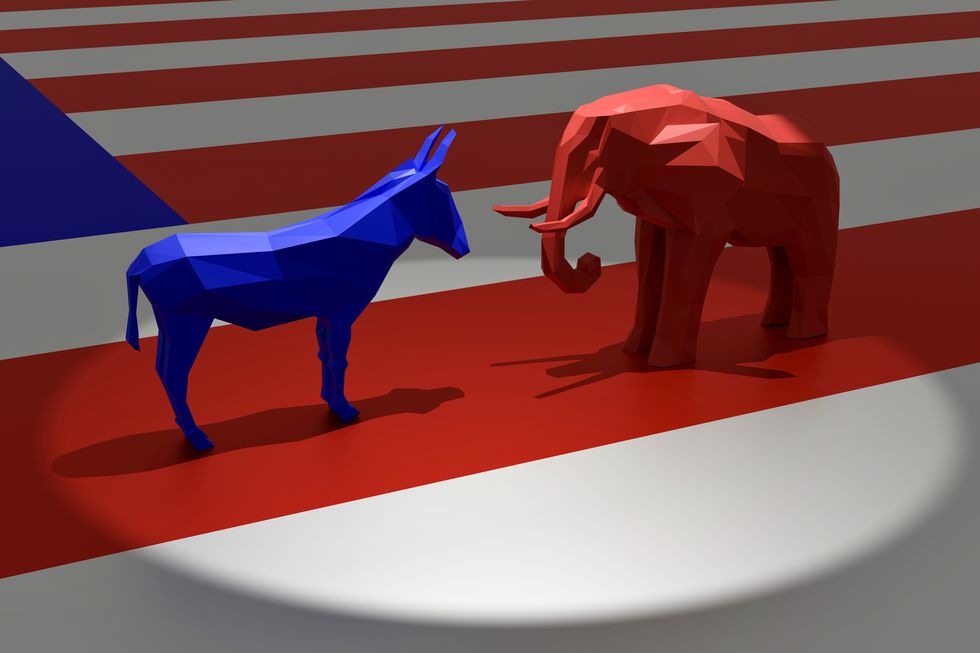 アメリカ大統領選2024のイメージ、民主党と共和党を表す青いロバと赤い象がスポットライトを浴びている図。