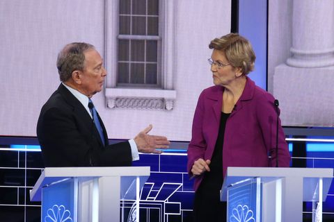 Democratic presidential candidates (L-R) former New York City Mayor Mike Bloomberg and Sen. Elizabeth Warren (D-MA) speak du