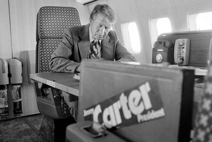 democratic presidential nominee jimmy carter working aboard the "peanut one" campaign airplane
